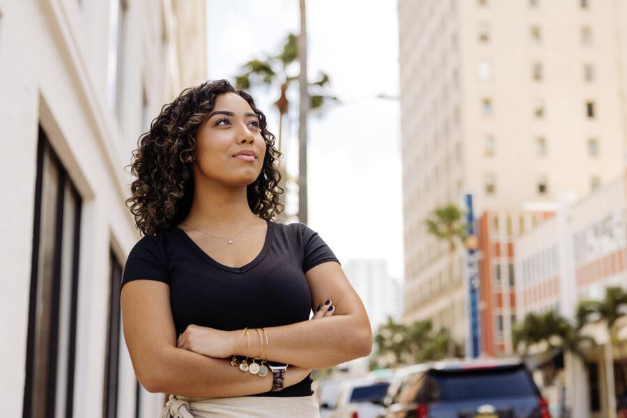 Student from Master of Accountancy 3+2 program stands outside in West Palm Beach.